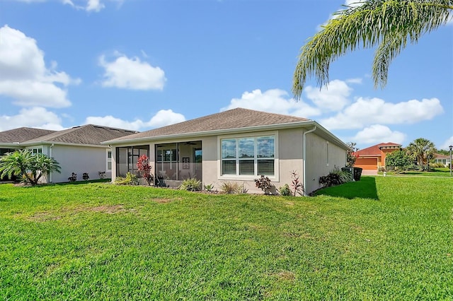 634 Via Corso Ct, Kissimmee, FL 34759 - ranch-style home with stucco siding, a sunroom, a front lawn, and ceiling fan