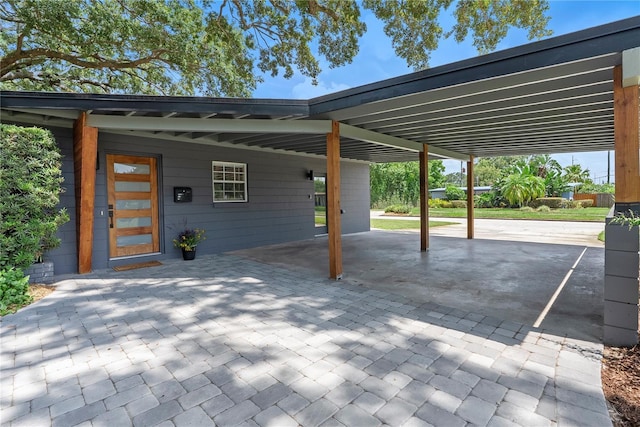 1401 Canberra Ave, Orlando, FL 32806 - view of patio / terrace with an attached carport