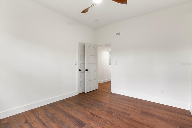 1401 Canberra Ave, Orlando, FL 32806 - empty room with ceiling fan, baseboards, and dark wood finished floors
