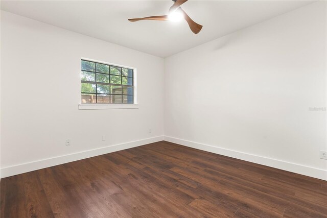 1401 Canberra Ave, Orlando, FL 32806 - empty room with ceiling fan, baseboards, dark wood finished floors, and lofted ceiling