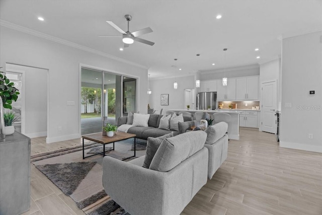 19073 Sabal St, Orlando, FL 32833 - living room with ceiling fan, recessed lighting, crown molding, baseboards, and light wood-style floors
