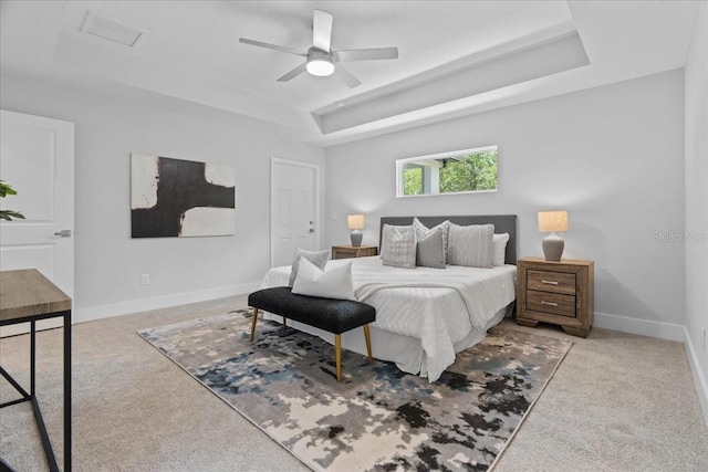 19073 Sabal St, Orlando, FL 32833 - bedroom with a tray ceiling, carpet, baseboards, and ceiling fan