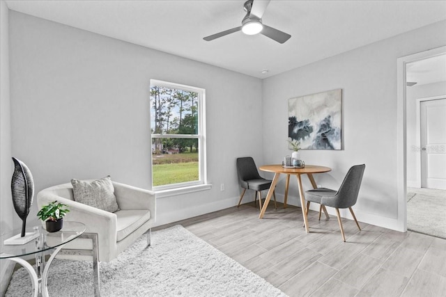 19073 Sabal St, Orlando, FL 32833 - sitting room featuring a ceiling fan, light wood-type flooring, and baseboards