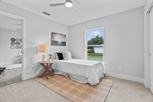 19073 Sabal St, Orlando, FL 32833 - bedroom featuring carpet, baseboards, and a ceiling fan