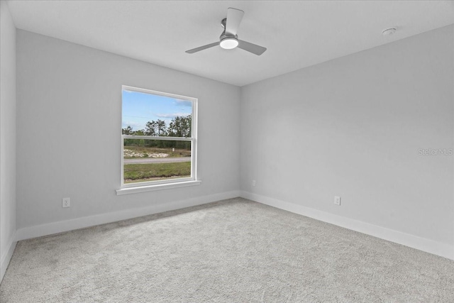 19073 Sabal St, Orlando, FL 32833 - empty room featuring carpet flooring, baseboards, and a ceiling fan
