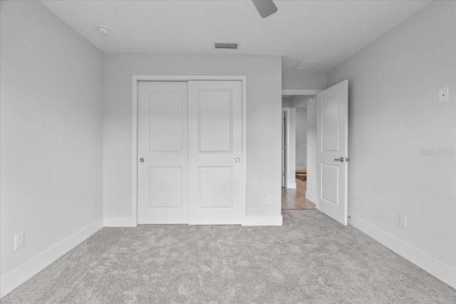 19073 Sabal St, Orlando, FL 32833 - unfurnished bedroom with a closet, carpet floors, baseboards, and a ceiling fan