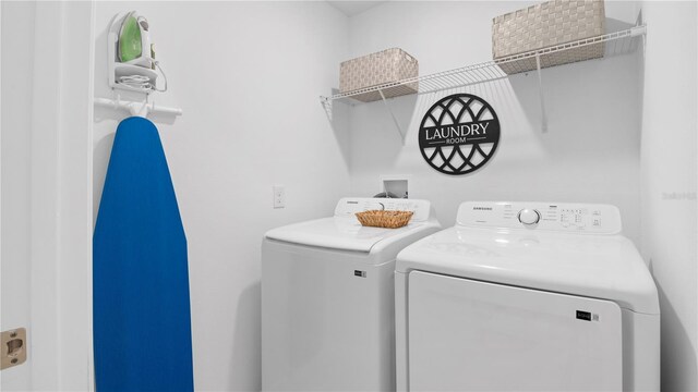 733 Longboat Dr, Davenport, FL 33896 - laundry room with independent washer and dryer