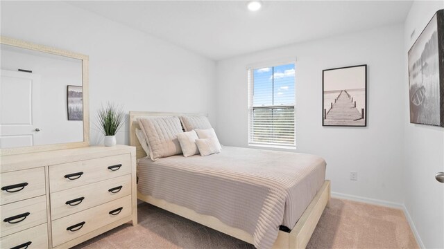 733 Longboat Dr, Davenport, FL 33896 - bedroom with light colored carpet and baseboards