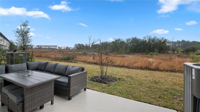 733 Longboat Dr, Davenport, FL 33896 - view of patio / terrace with cooling unit and an outdoor living space
