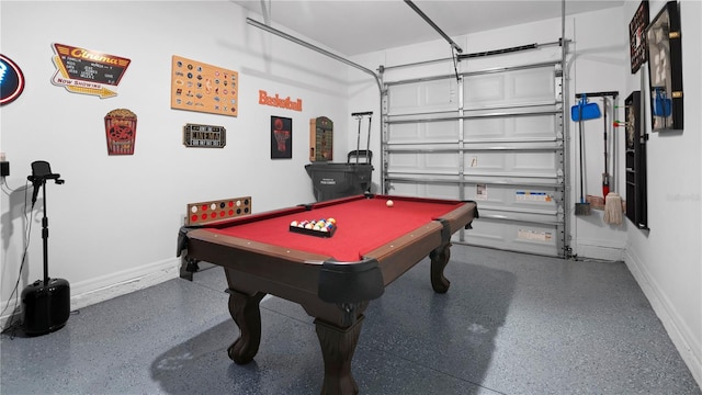 733 Longboat Dr, Davenport, FL 33896 - recreation room featuring speckle patterned floor, baseboards, billiards table, and a garage