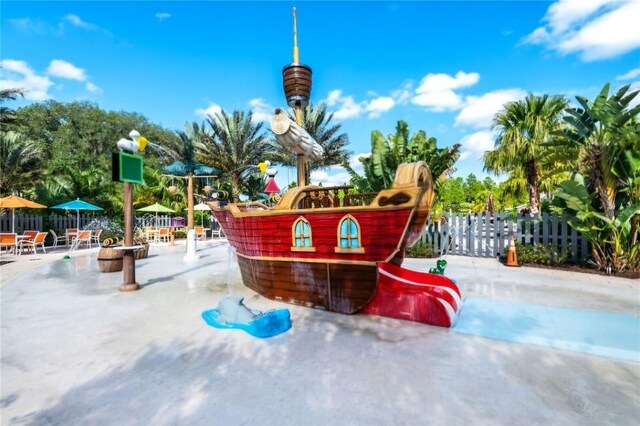 733 Longboat Dr, Davenport, FL 33896 - view of community with fence and a patio