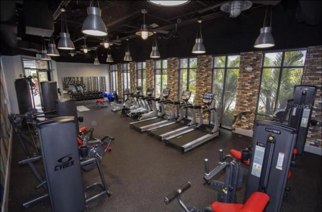 733 Longboat Dr, Davenport, FL 33896 - exercise room with a ceiling fan