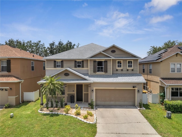 325 Aldridge Ln, Davenport, FL 33897 - view of front facade featuring roof with shingles, a garage, driveway, covered porch, and stucco siding