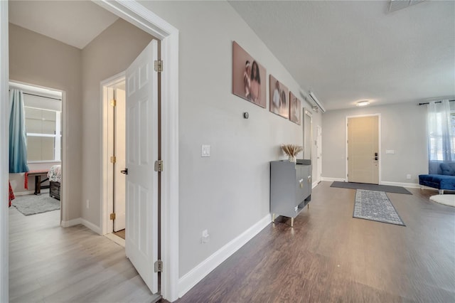 325 Aldridge Ln, Davenport, FL 33897 - foyer featuring wood finished floors and baseboards