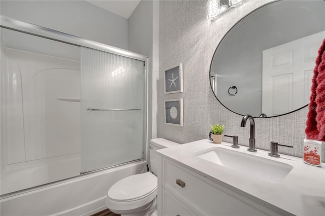 325 Aldridge Ln, Davenport, FL 33897 - full bath featuring toilet, vanity, and shower / bath combination with glass door