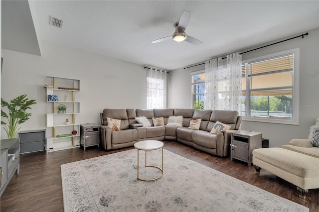 325 Aldridge Ln, Davenport, FL 33897 - living area with ceiling fan and dark wood-type flooring