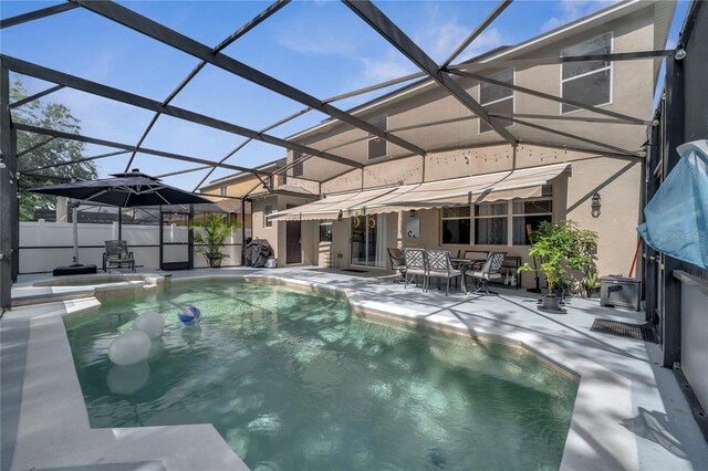 325 Aldridge Ln, Davenport, FL 33897 - view of swimming pool featuring a patio, a pool with connected hot tub, and a lanai