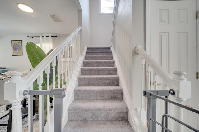 325 Aldridge Ln, Davenport, FL 33897 - staircase with carpet
