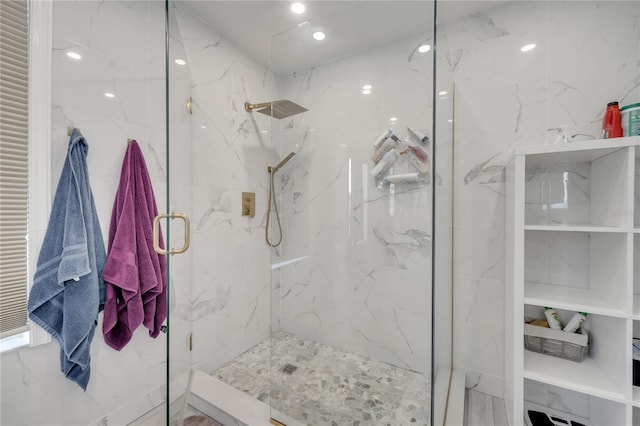 325 Aldridge Ln, Davenport, FL 33897 - full bath featuring a marble finish shower