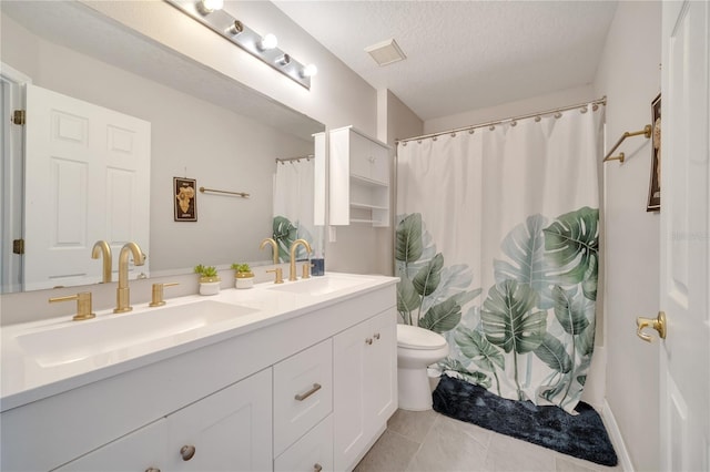 325 Aldridge Ln, Davenport, FL 33897 - bathroom featuring double vanity, toilet, a textured ceiling, tile patterned flooring, and shower / bath combo with shower curtain