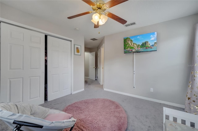 325 Aldridge Ln, Davenport, FL 33897 - bedroom with carpet floors, baseboards, a closet, and a ceiling fan
