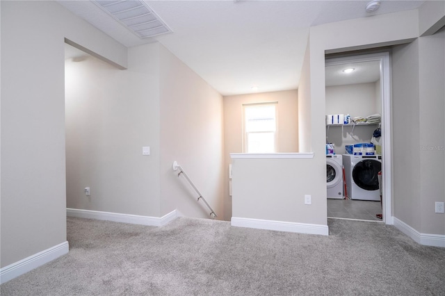 12133 Bracco St, Winter Garden, FL 34787 - unfurnished room featuring separate washer and dryer, carpet flooring, baseboards, and a smoke detector