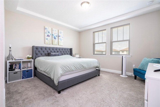 12133 Bracco St, Winter Garden, FL 34787 - carpeted bedroom with a raised ceiling and baseboards