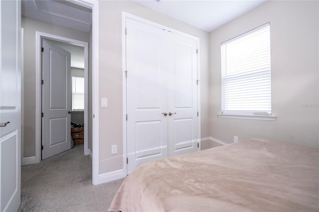 12133 Bracco St, Winter Garden, FL 34787 - carpeted bedroom with a closet and baseboards