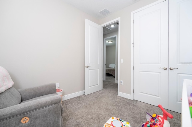 12133 Bracco St, Winter Garden, FL 34787 - living area featuring carpet floors and baseboards