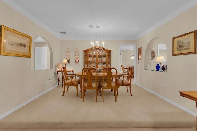 303 S Sweetwater Blvd, Longwood, FL 32779 - dining area featuring light carpet, arched walkways, ornamental molding, baseboards, and a chandelier