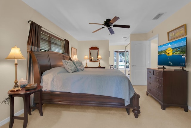 303 S Sweetwater Blvd, Longwood, FL 32779 - bedroom with light carpet, baseboards, and a ceiling fan