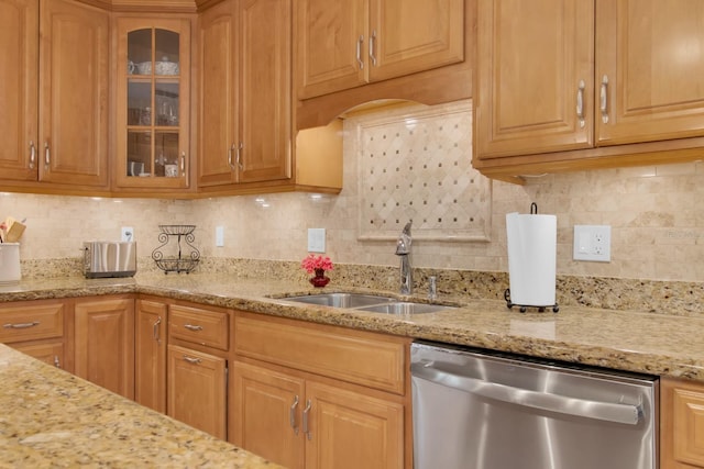 303 S Sweetwater Blvd, Longwood, FL 32779 - kitchen featuring dishwasher, a sink, glass insert cabinets, and light stone countertops