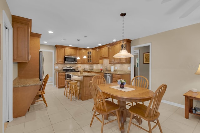 303 S Sweetwater Blvd, Longwood, FL 32779 - dining space with light tile patterned flooring, recessed lighting, and baseboards