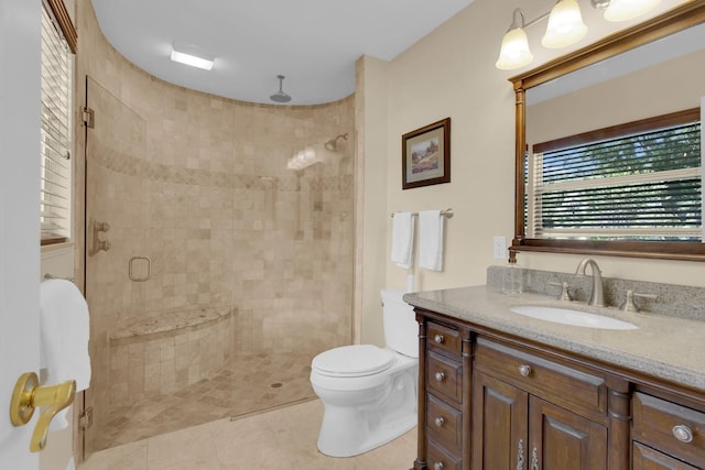 303 S Sweetwater Blvd, Longwood, FL 32779 - bathroom with a shower stall, vanity, toilet, and tile patterned floors