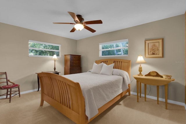 303 S Sweetwater Blvd, Longwood, FL 32779 - carpeted bedroom featuring multiple windows, baseboards, and ceiling fan
