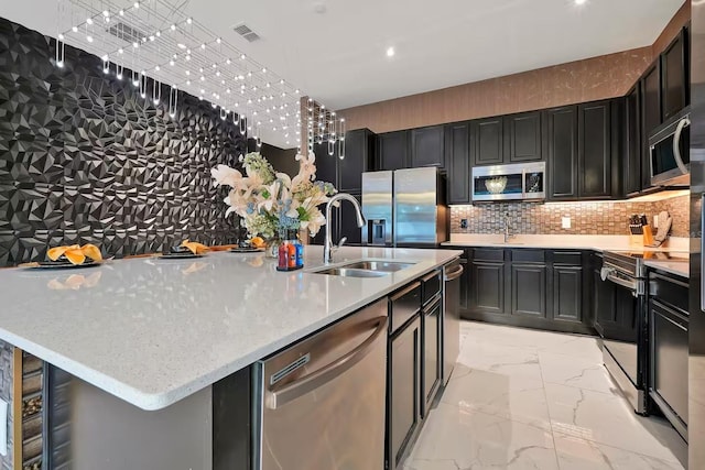4441 Ganesha Loop, Kissimmee, FL 34746 - kitchen with appliances with stainless steel finishes, a sink, dark cabinetry, and recessed lighting