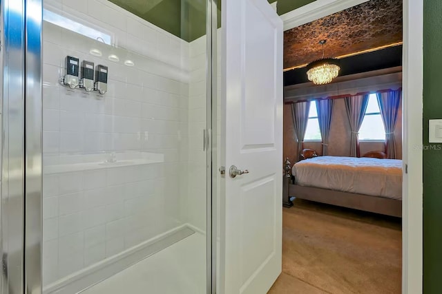 4441 Ganesha Loop, Kissimmee, FL 34746 - full bath with a stall shower, connected bathroom, and a chandelier