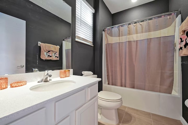 4441 Ganesha Loop, Kissimmee, FL 34746 - bathroom featuring tile patterned flooring, vanity, shower / tub combo, toilet, and a textured wall