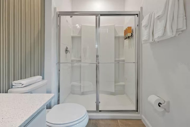 4441 Ganesha Loop, Kissimmee, FL 34746 - full bathroom with a stall shower, toilet, and tile patterned floors