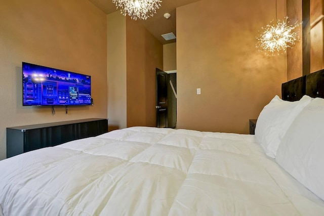 4441 Ganesha Loop, Kissimmee, FL 34746 - bedroom featuring a chandelier
