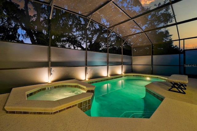 4441 Ganesha Loop, Kissimmee, FL 34746 - swimming pool with an in-ground hot tub and a lanai