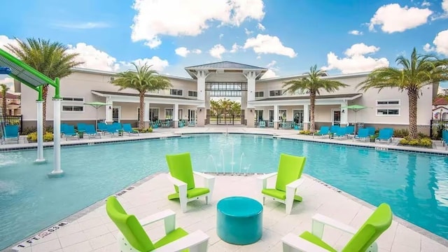 4441 Ganesha Loop, Kissimmee, FL 34746 - community pool featuring a patio area