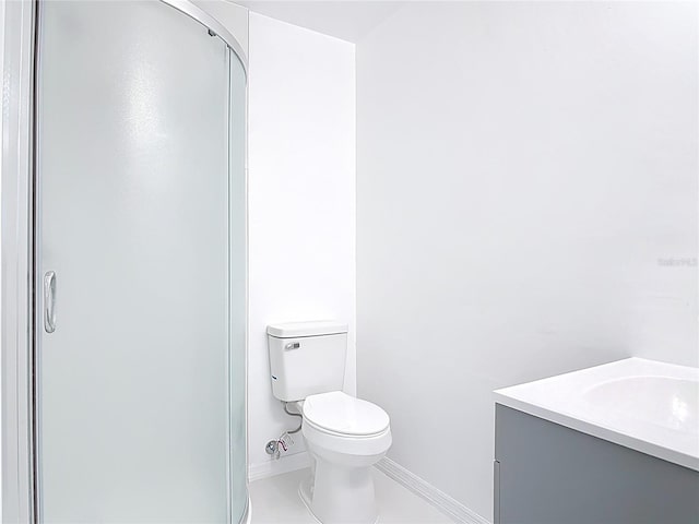 1113 Leeward Dr, Deltona, FL 32738 - bathroom featuring baseboards, toilet, vanity, and a stall shower
