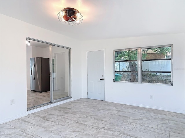 1113 Leeward Dr, Deltona, FL 32738 - empty room with baseboards