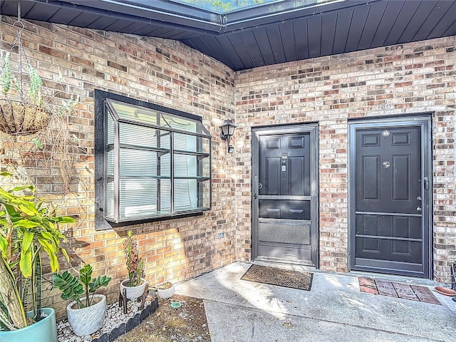 1803 Foxhall Cir Unit 1803, Kissimmee, FL 34741 - entrance to property with brick siding