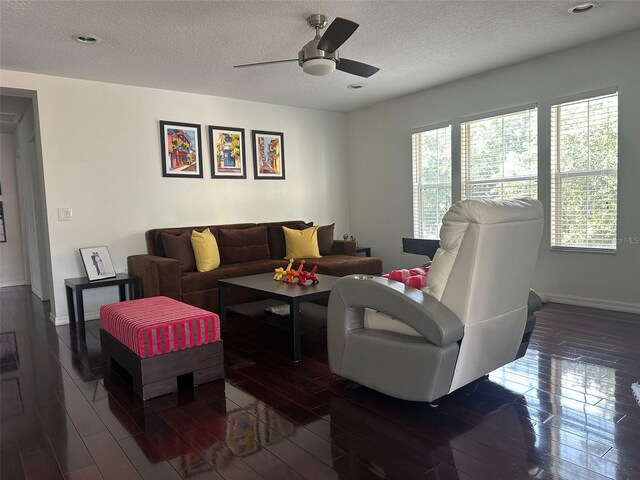 10148 Malpas Pt, Orlando, FL 32832 - living area featuring baseboards, ceiling fan, a textured ceiling, dark wood-style floors, and recessed lighting