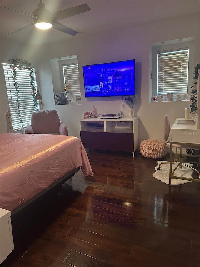 10148 Malpas Pt, Orlando, FL 32832 - bedroom featuring hardwood / wood-style floors and a ceiling fan