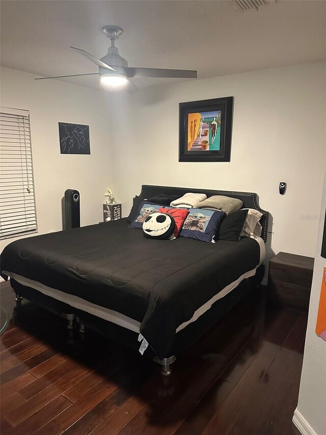10148 Malpas Pt, Orlando, FL 32832 - bedroom with hardwood / wood-style flooring and a ceiling fan