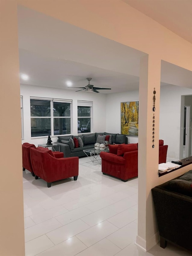 10148 Malpas Pt, Orlando, FL 32832 - living area featuring ceiling fan and light tile patterned floors