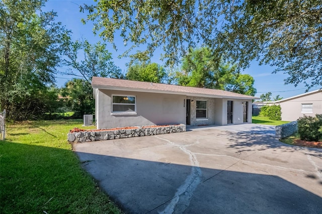 4226 Kelly Miller Ct, Orlando, FL 32811 - view of patio / terrace featuring concrete driveway and central AC